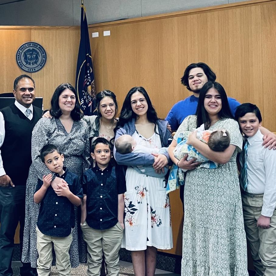 Author Mari Magalei and family gather for a group photo
